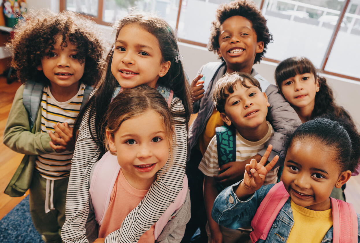 Class selfie in an elementary school. Kids taking a picture together in a co ed school